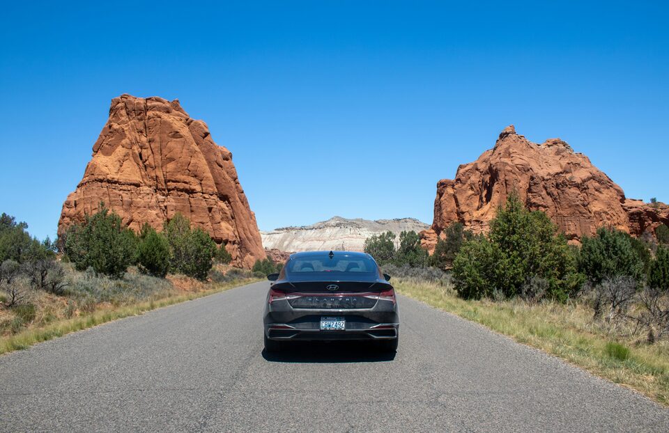 A car on an open desert road