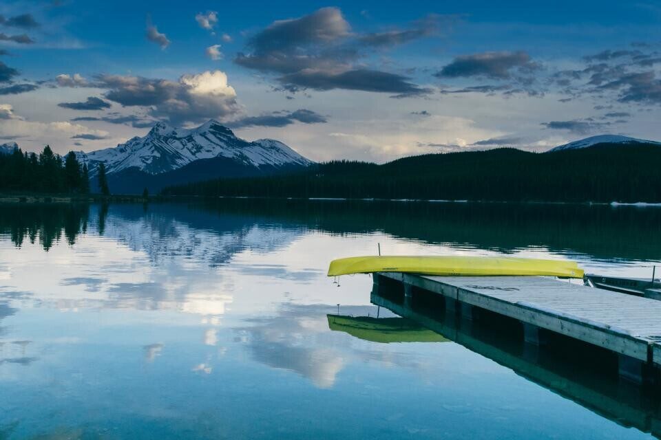 A floating dock on a mountain lake