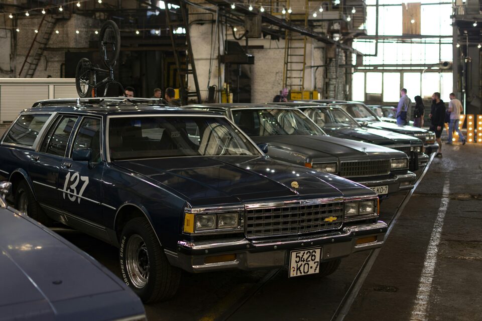 Rows of vehicles parked across a dealer lot