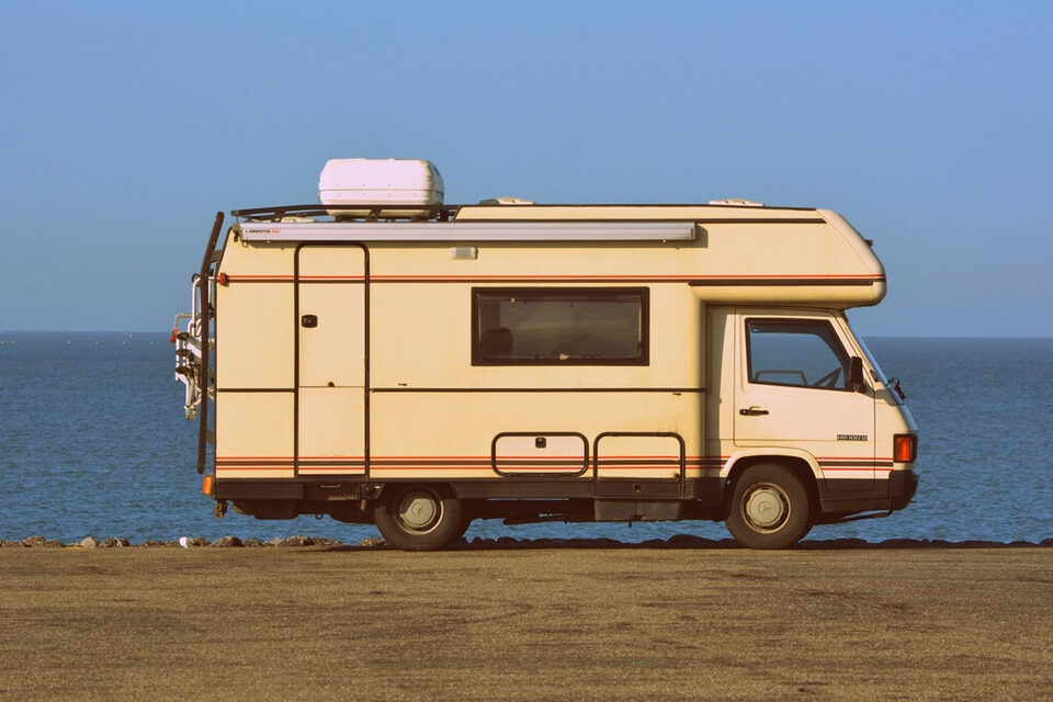 A vintage motorhome on the coast