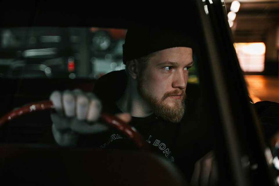 A driver at the wheel at night