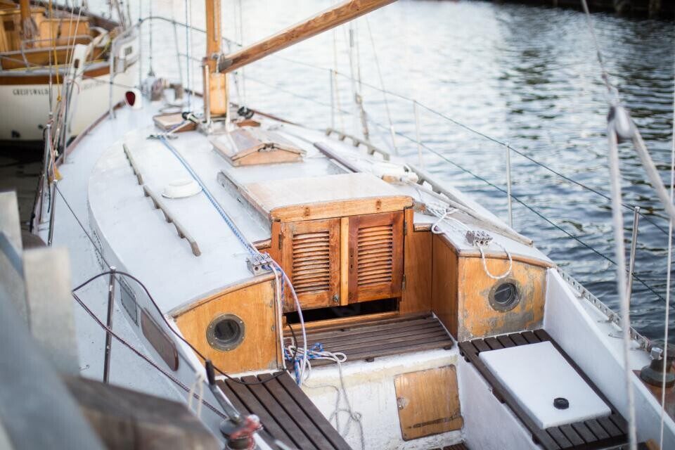 The polished deck of a sailboat