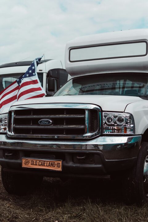 A white pickup truck parked on a lot